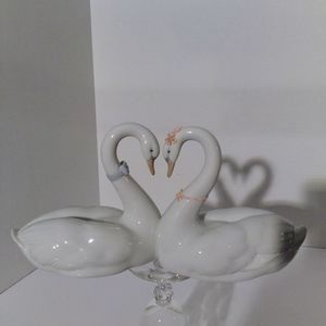 Lladro porcelain swans